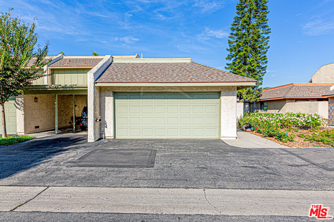 1941 Pine Drive La Habra, CA 90631 - Photo 2 of 35 a front view of a house with a yard and garage