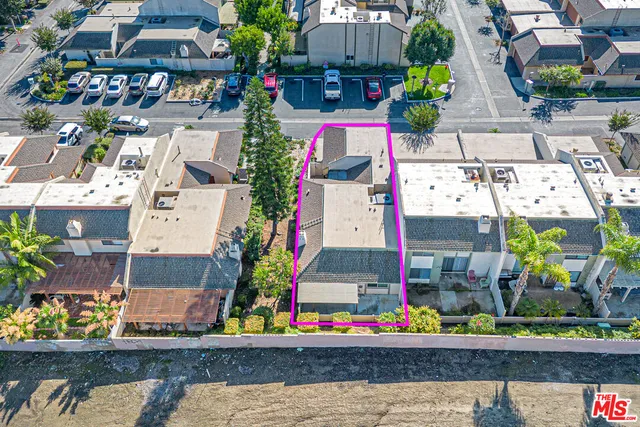 a street sign on a brick wall