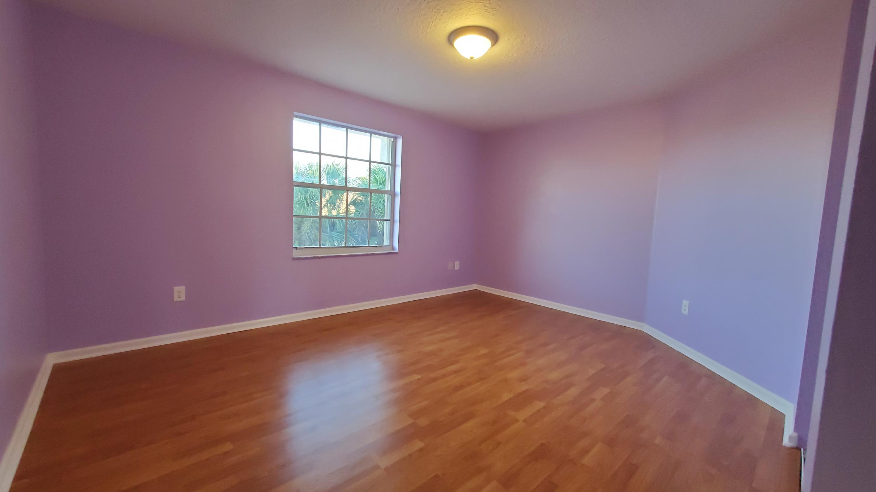 2252 Ridgewood Circle Royal Palm Beach, FL 33411 - Photo 24 of 40 an empty room with a window