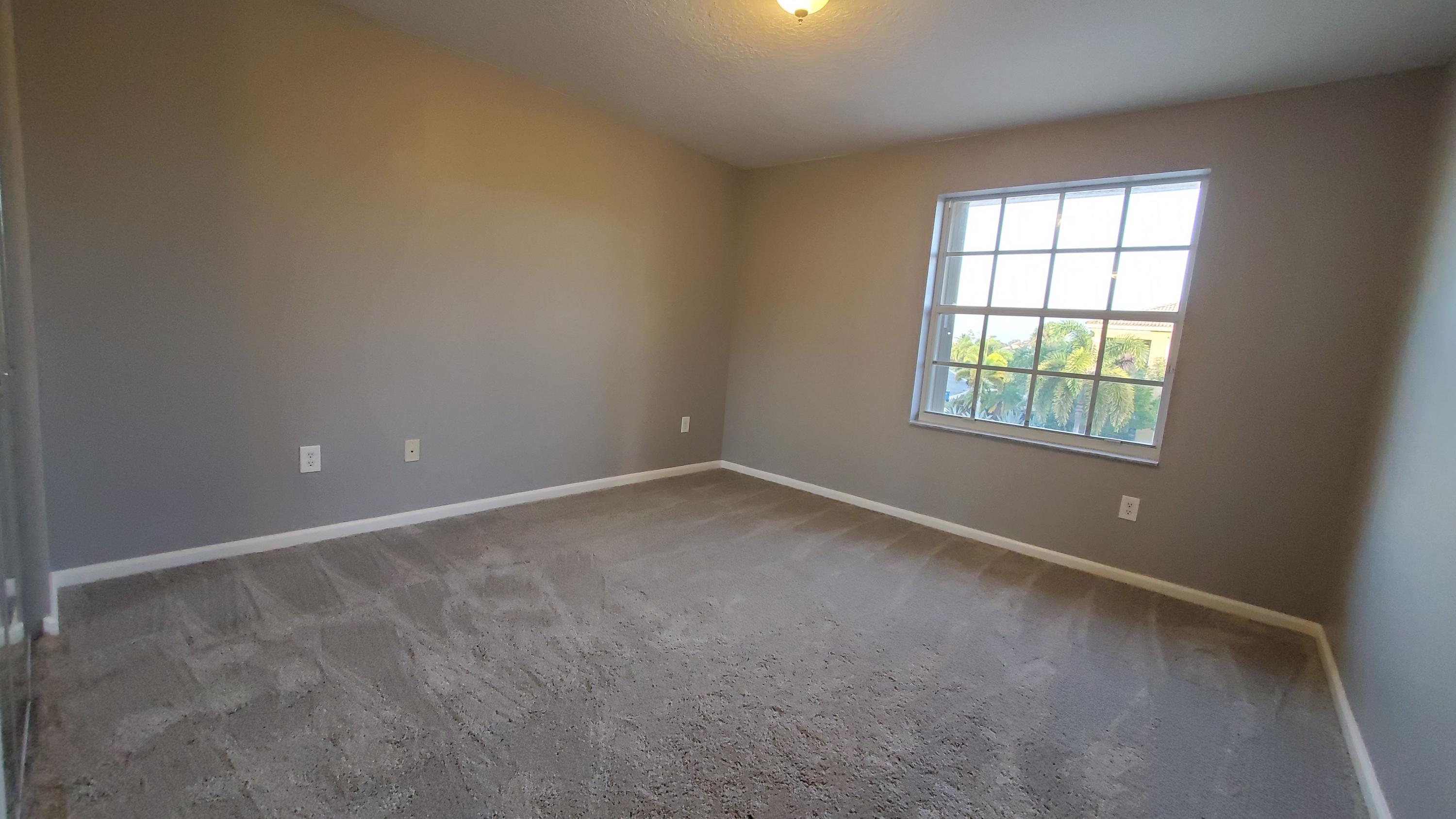 2252 Ridgewood Circle Royal Palm Beach, FL 33411 - Photo 26 of 40 an empty room with a window