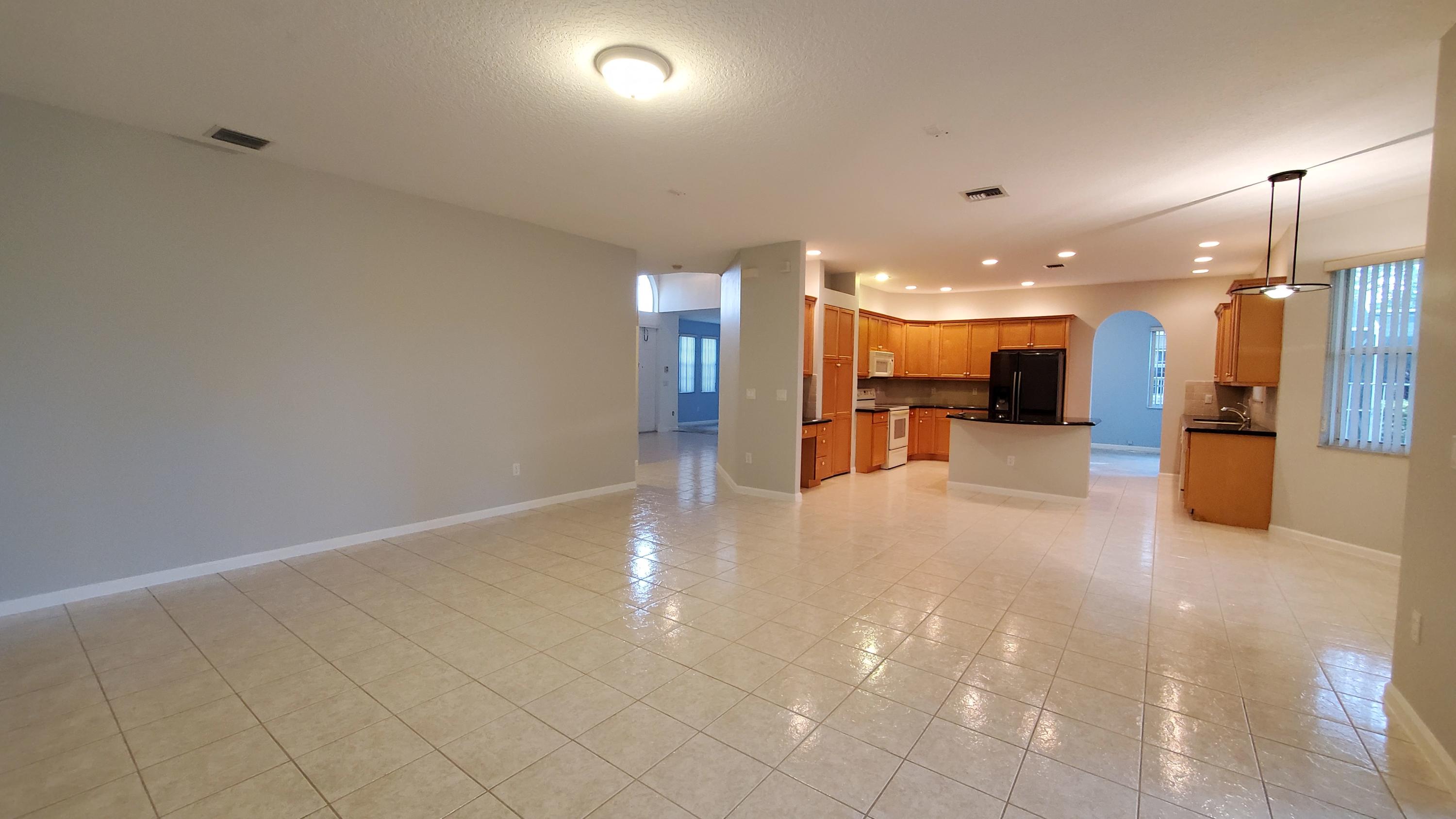 2252 Ridgewood Circle Royal Palm Beach, FL 33411 - Photo 5 of 40 a view of a lobby with a garage