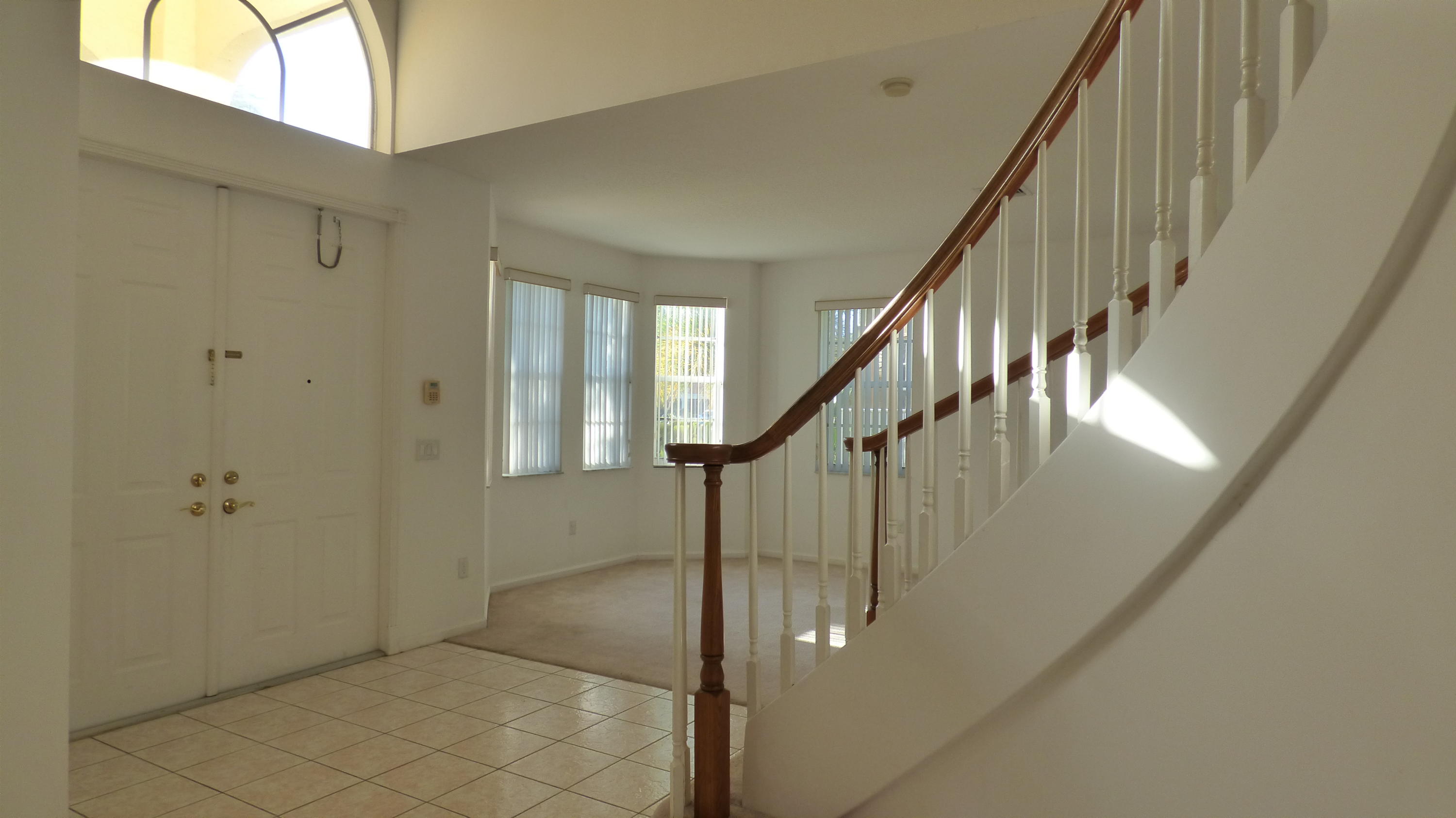 2252 Ridgewood Circle Royal Palm Beach, FL 33411 - Photo 10 of 40 a view of an entryway