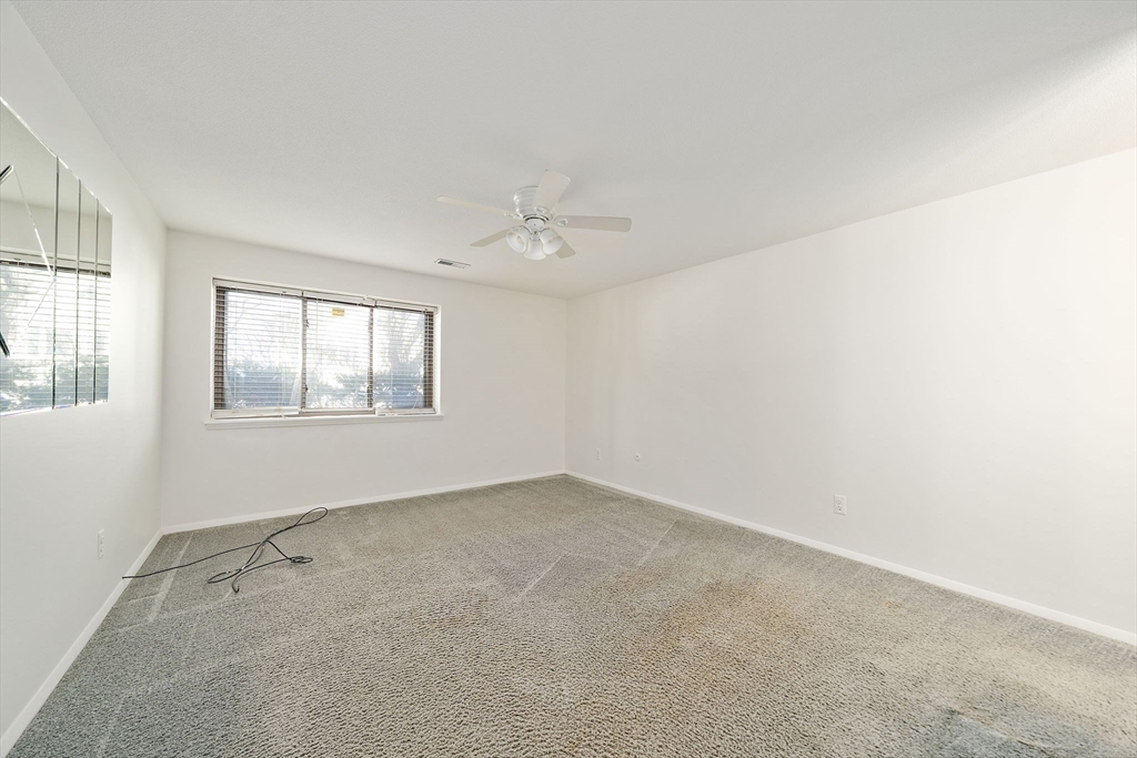 30 Church Street, Unit 4 Braintree, MA 02184 - Photo 14 of 23 an empty room with windows