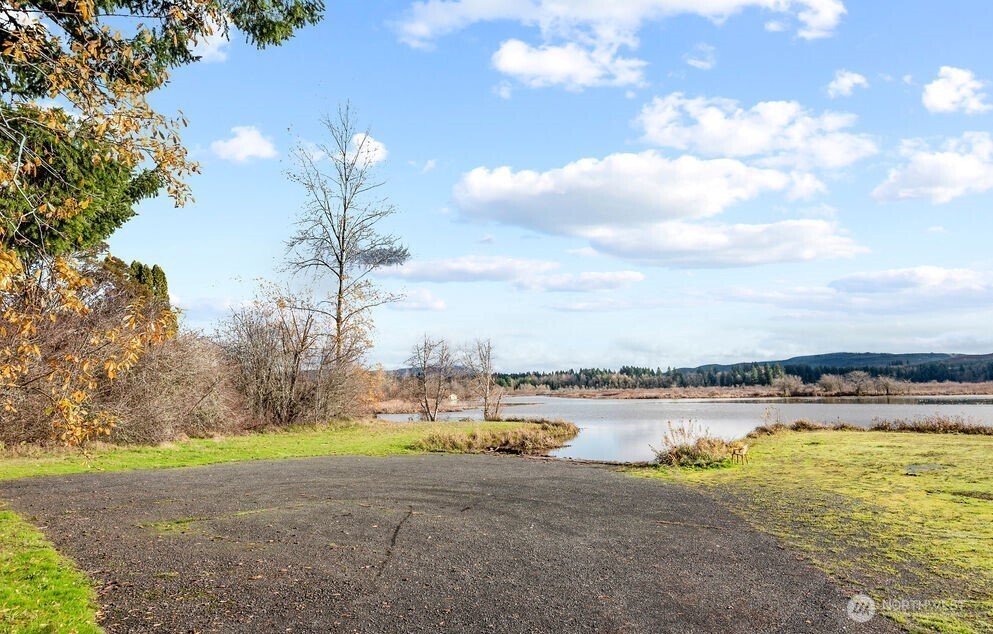 114 Mason Road Silverlake, WA 98645 - Photo 29 of 29 a view of a lake with houses in the background