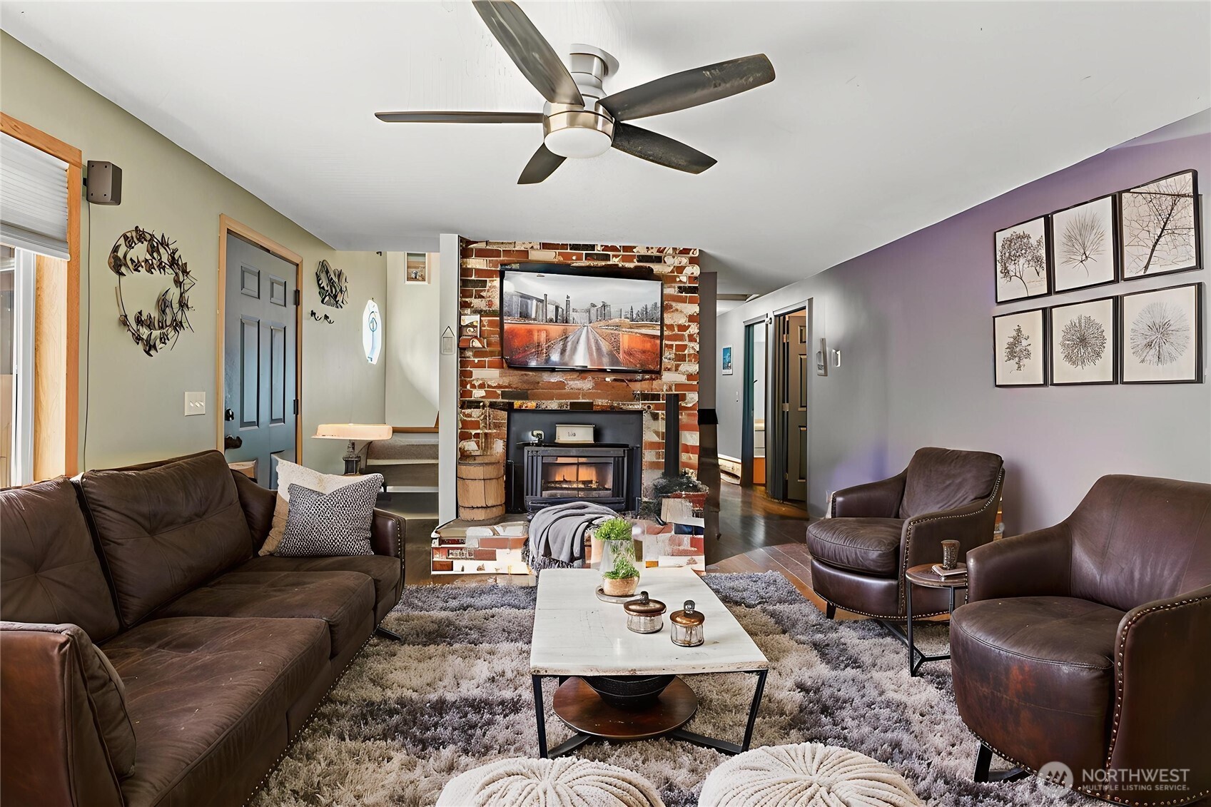 114 Mason Road Silverlake, WA 98645 - Photo 3 of 29 a living room with furniture ceiling fan and a flat screen tv