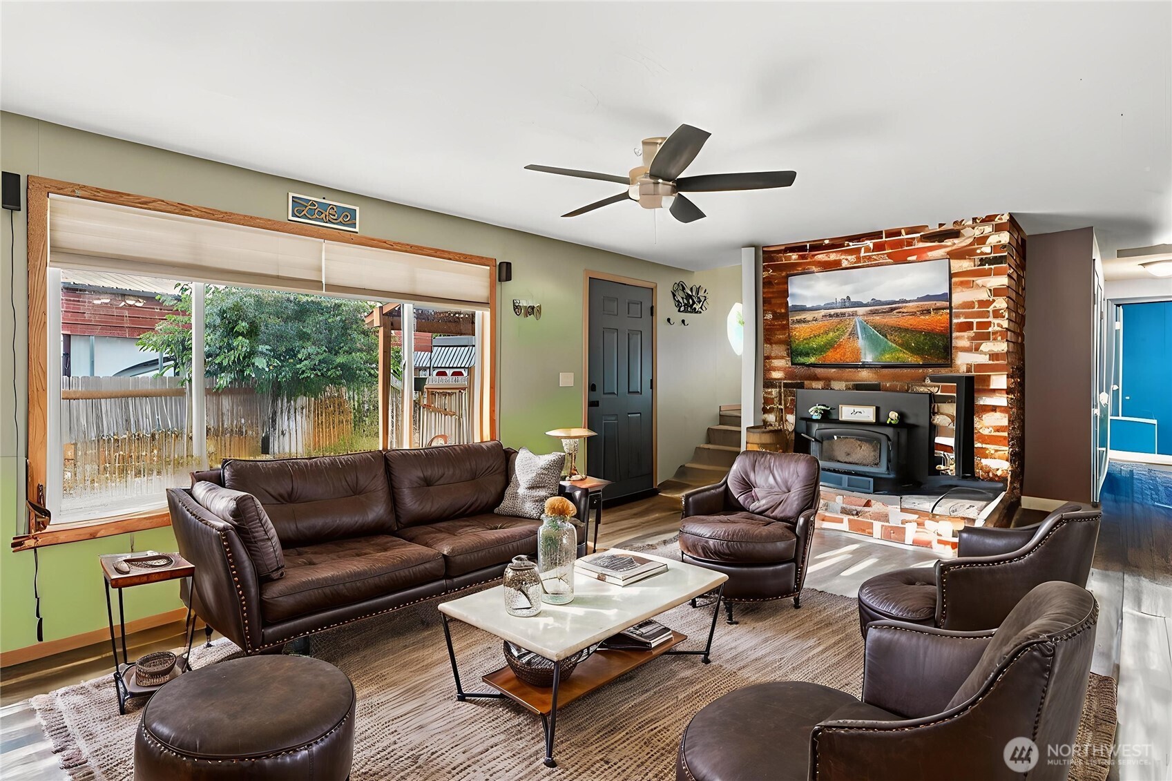 114 Mason Road Silverlake, WA 98645 - Photo 4 of 29 a living room with furniture and a flat screen tv