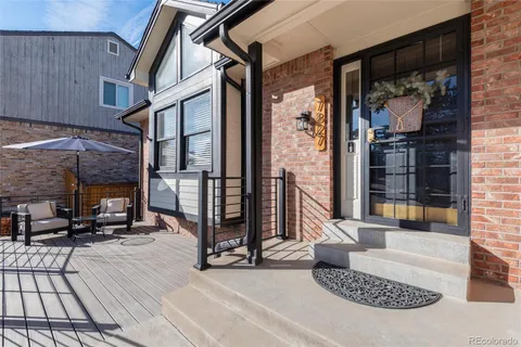 a view of a porch with furniture