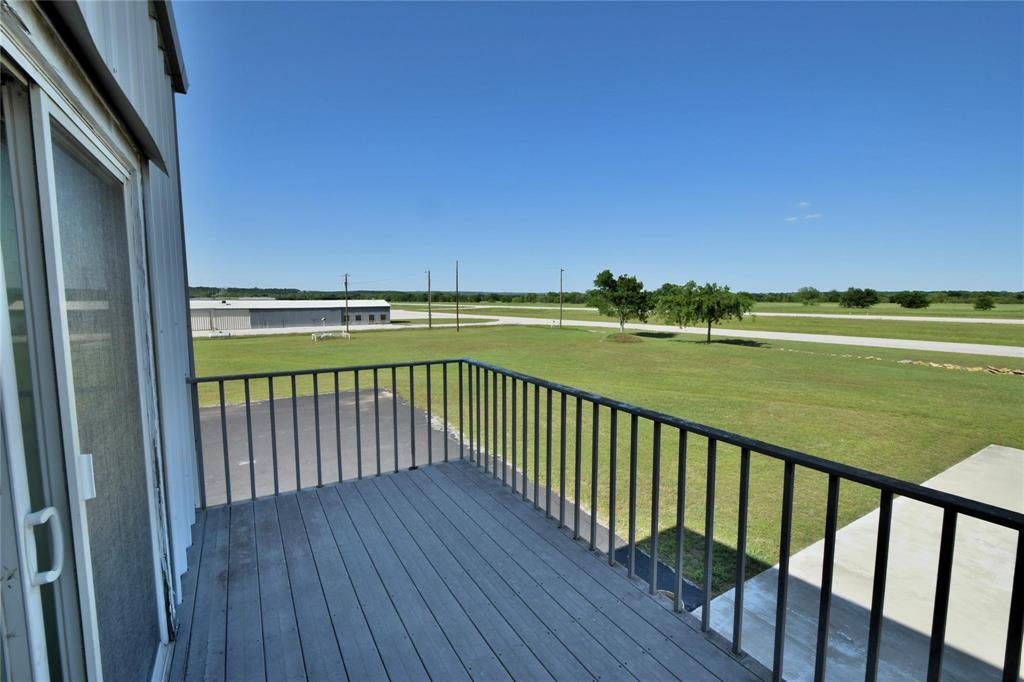 108 Barham Lane Bridgeport, TX 76426 - Photo 23 of 30 a view of outdoor space with deck and yard