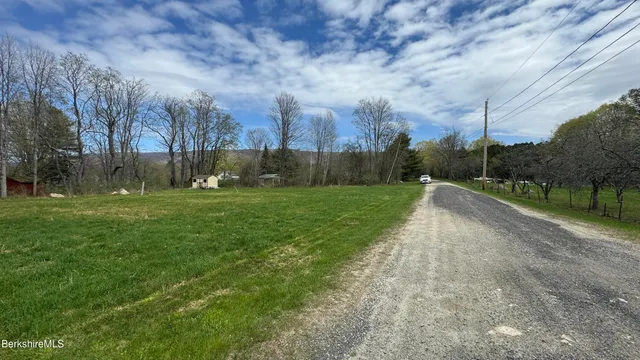 a view of a yard in front of a yard