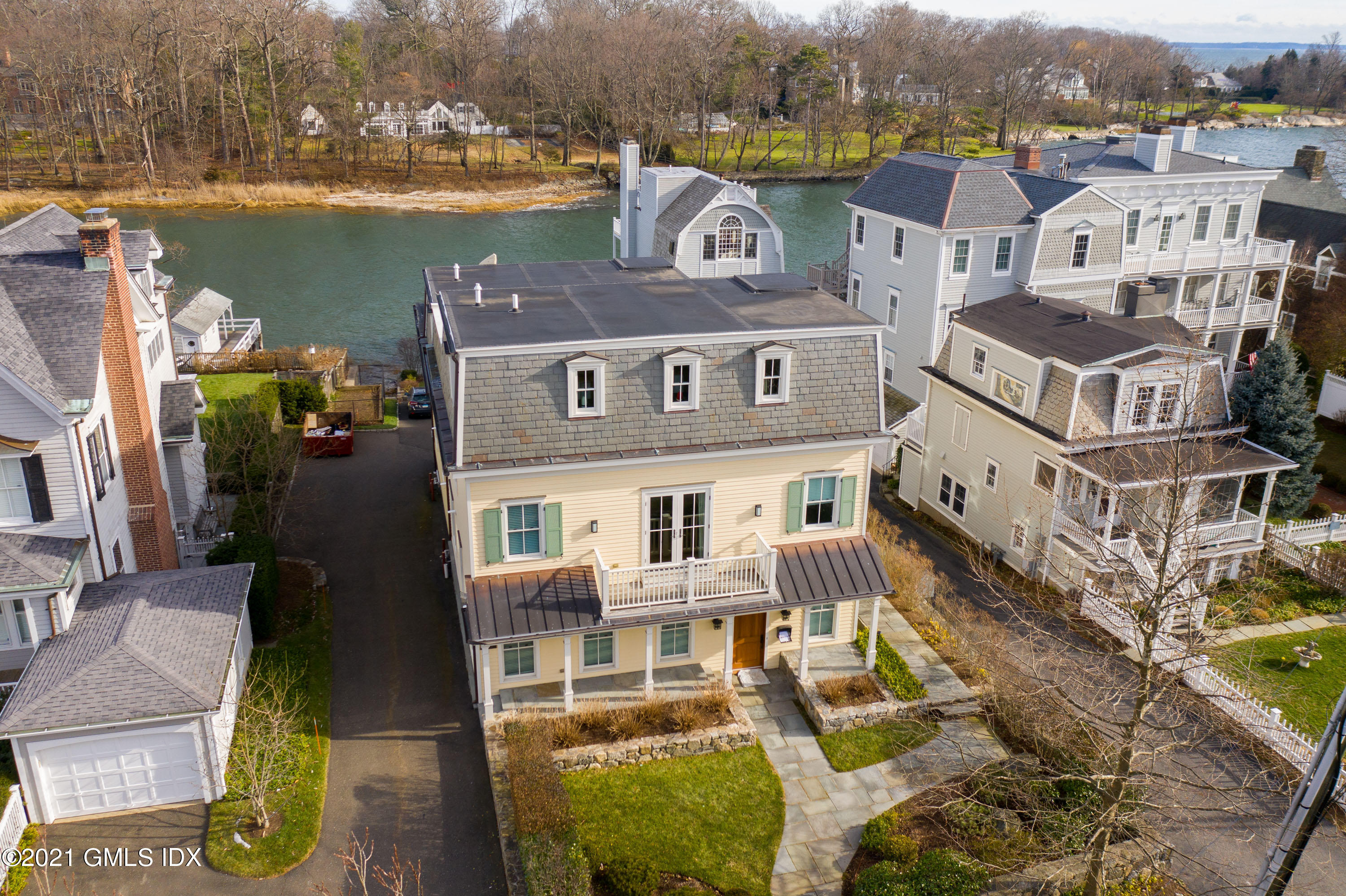 623 Steamboat Road, Unit A Greenwich, CT 06830 - Photo 1 of 43 an aerial view of a house with a lake view