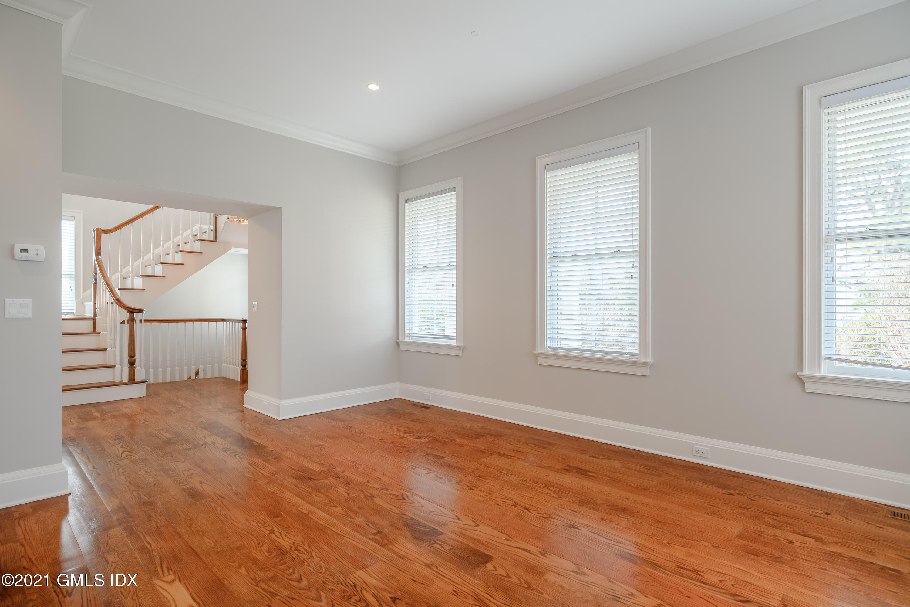 623 Steamboat Road, Unit A Greenwich, CT 06830 - Photo 10 of 43 an empty room with windows and closet