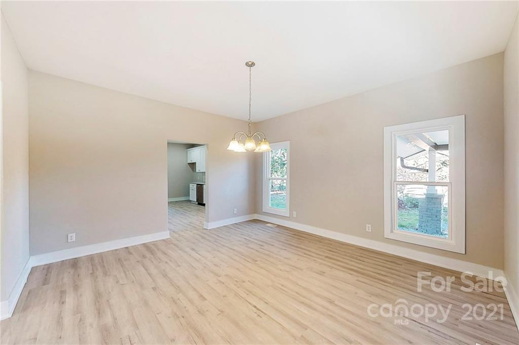 313 Old Williams Road Wingate, NC 28174 - Photo 24 of 46 wooden floor in an empty room with a window