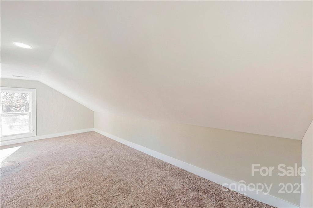 313 Old Williams Road Wingate, NC 28174 - Photo 34 of 46 an empty room with windows
