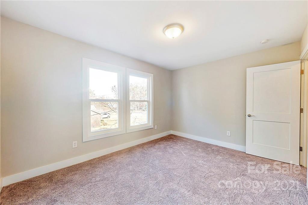 313 Old Williams Road Wingate, NC 28174 - Photo 38 of 46 an empty room with windows