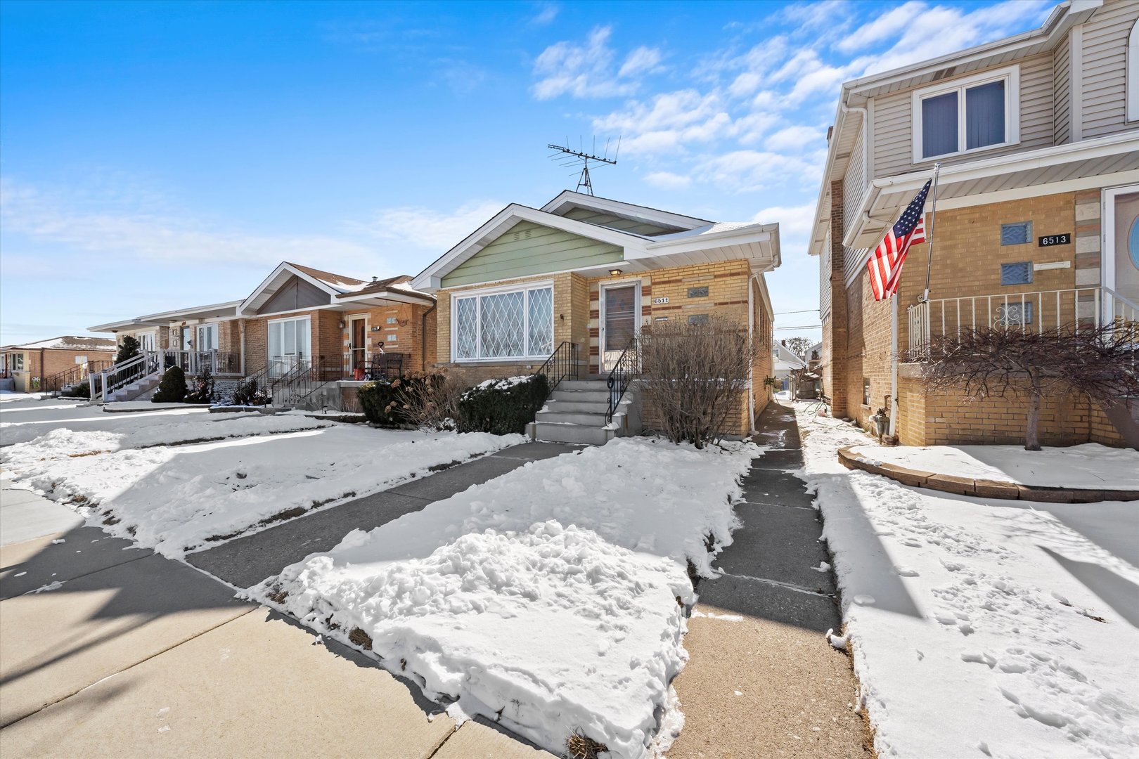 6511 West 63rd Place Chicago, IL 60638 - Photo 12 of 12 a view of a front of a house with a yard