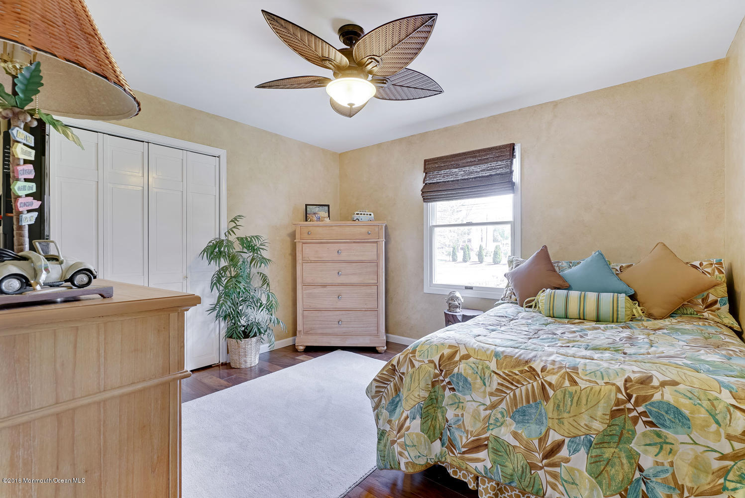 370 Cook Road Jackson, NJ 08527 - Photo 15 of 35 a bedroom with a bed and a potted plant