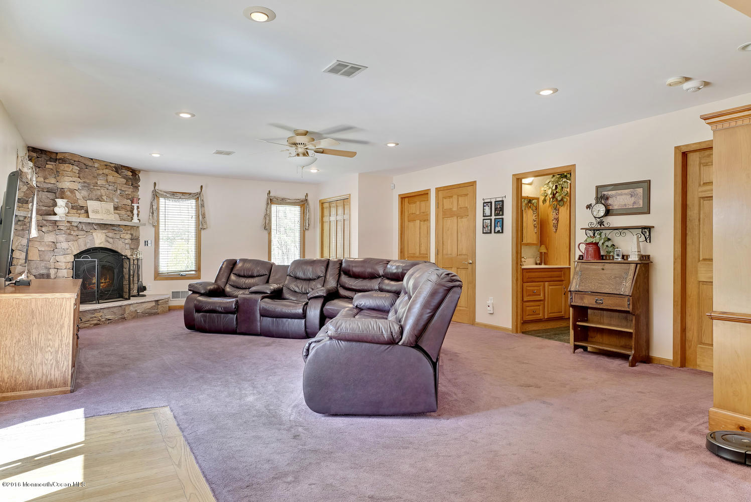 370 Cook Road Jackson, NJ 08527 - Photo 16 of 35 a living room with furniture fireplace and a large window