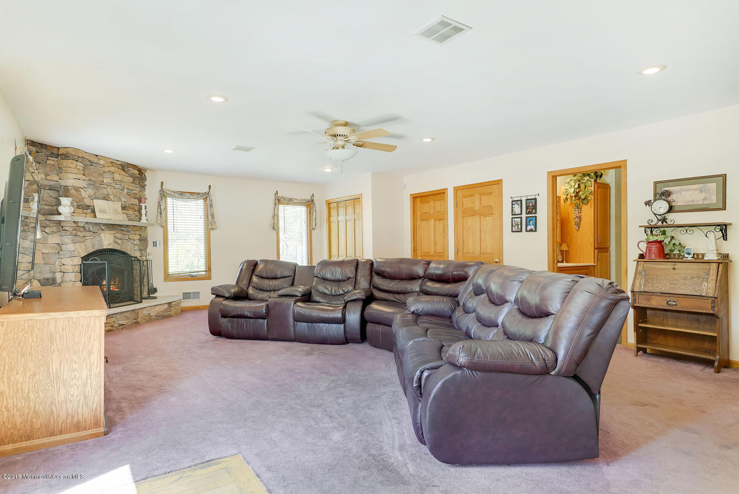 370 Cook Road Jackson, NJ 08527 - Photo 17 of 35 a living room with furniture fireplace and a large window