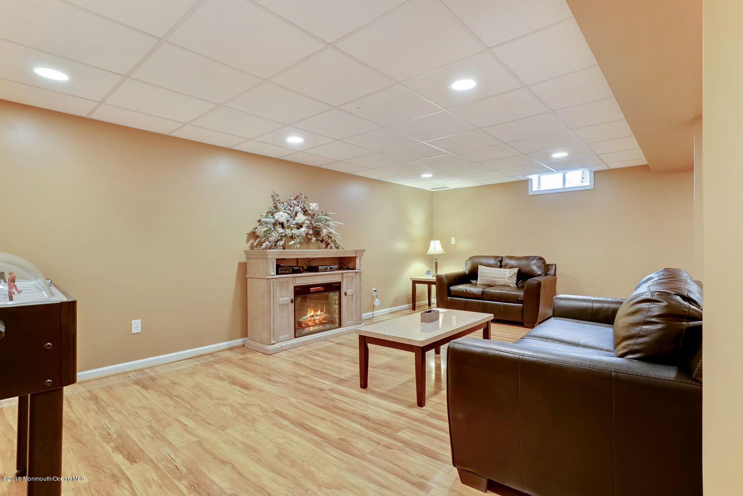 370 Cook Road Jackson, NJ 08527 - Photo 22 of 35 a bed room with furniture and a fireplace