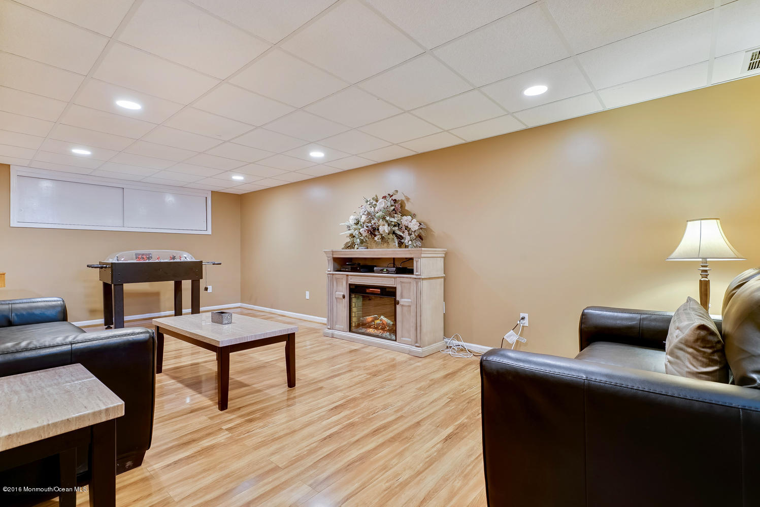 370 Cook Road Jackson, NJ 08527 - Photo 23 of 35 a living room with furniture and a fireplace