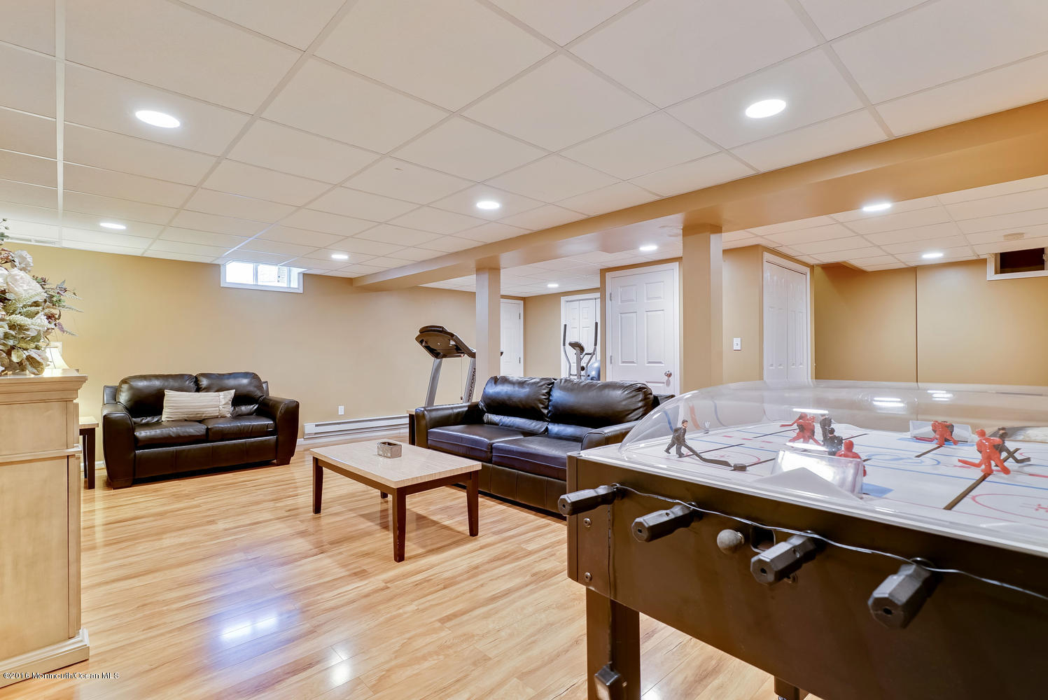 370 Cook Road Jackson, NJ 08527 - Photo 24 of 35 a living room with furniture a table and wooden floor