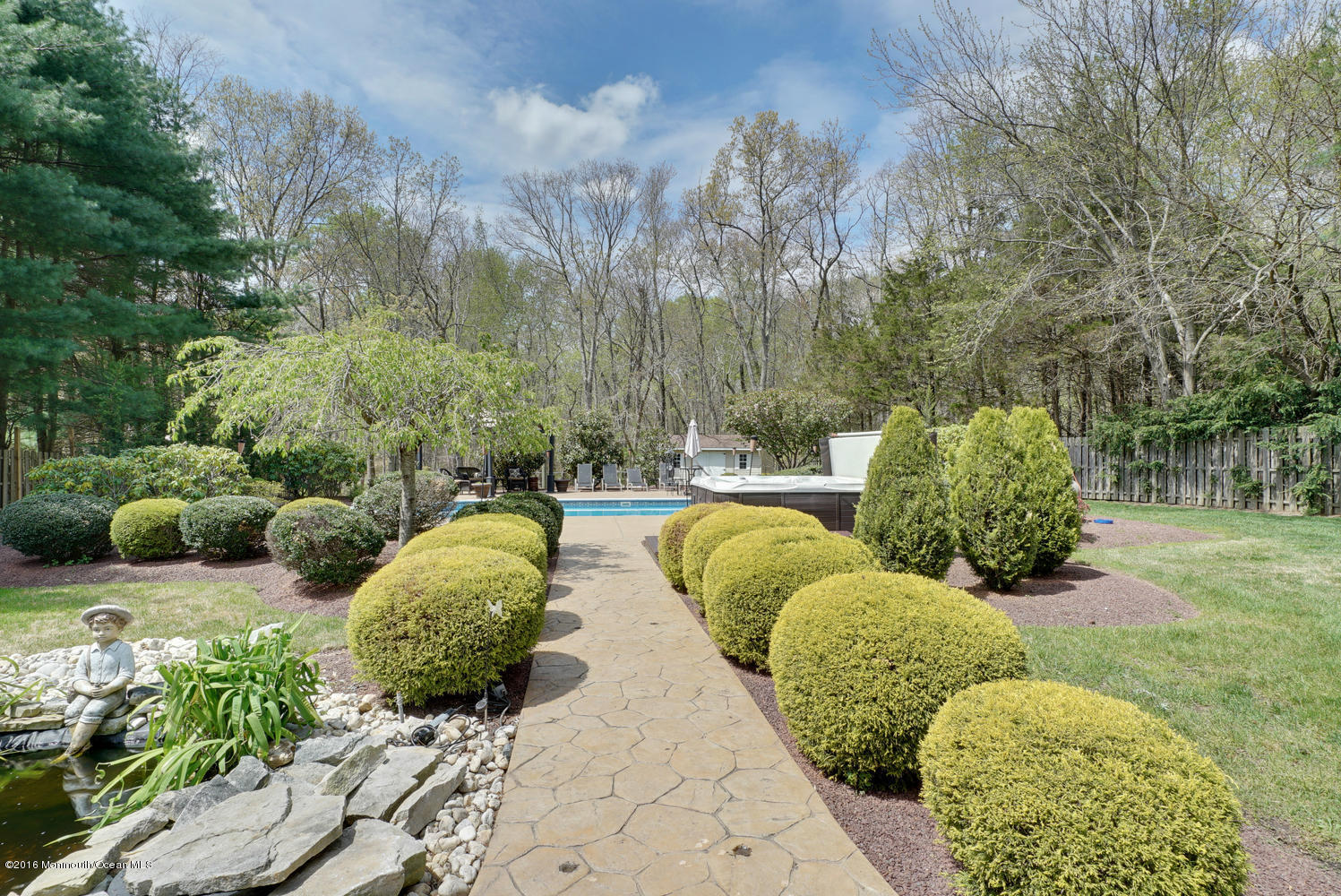 370 Cook Road Jackson, NJ 08527 - Photo 28 of 35 a view of a garden with plants and large trees