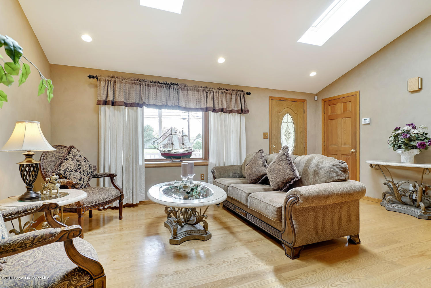 370 Cook Road Jackson, NJ 08527 - Photo 4 of 35 a living room with furniture and a large window