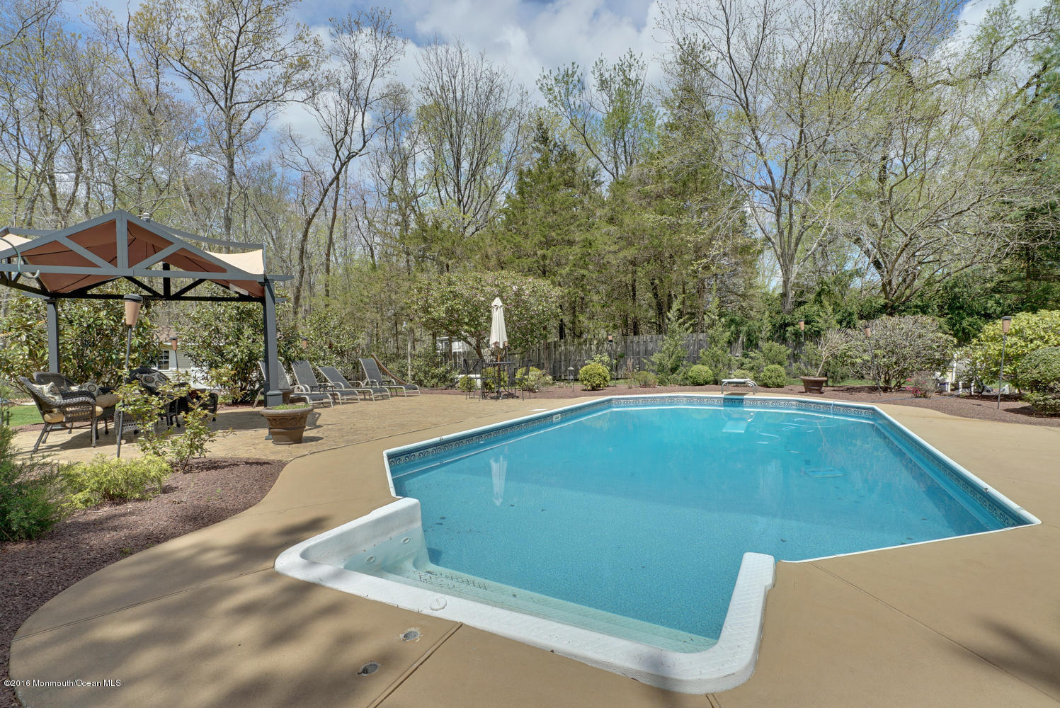 370 Cook Road Jackson, NJ 08527 - Photo 32 of 35 a view of a swimming pool with a patio