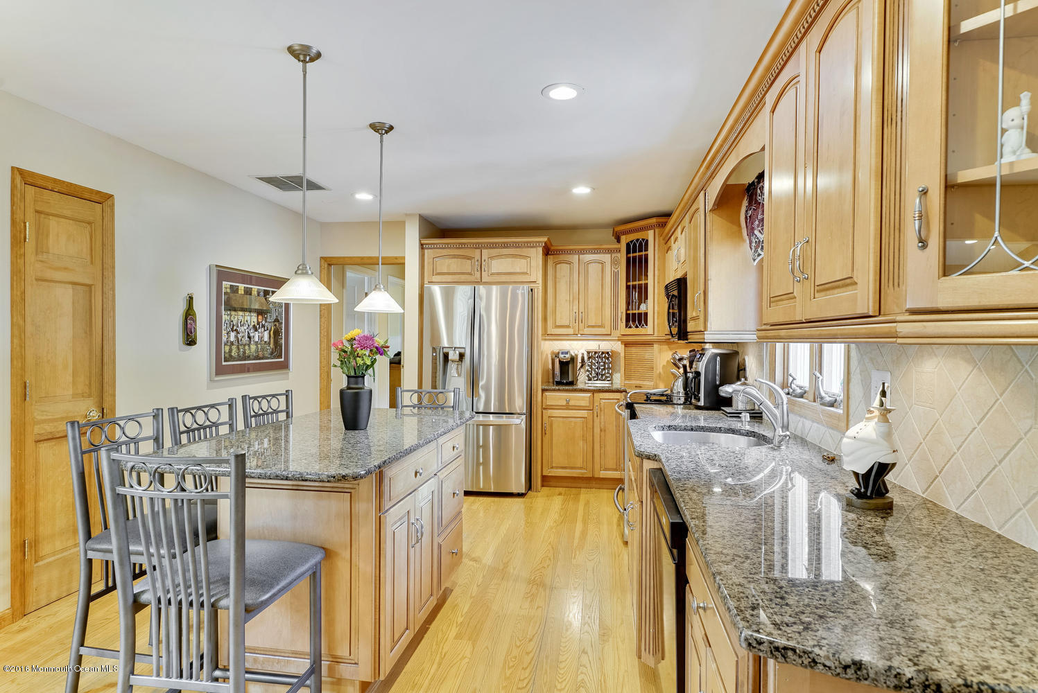 370 Cook Road Jackson, NJ 08527 - Photo 10 of 35 a kitchen with stainless steel appliances granite countertop sink stove and refrigerator