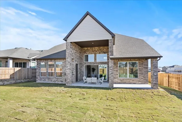 front view of a house with a swimming pool