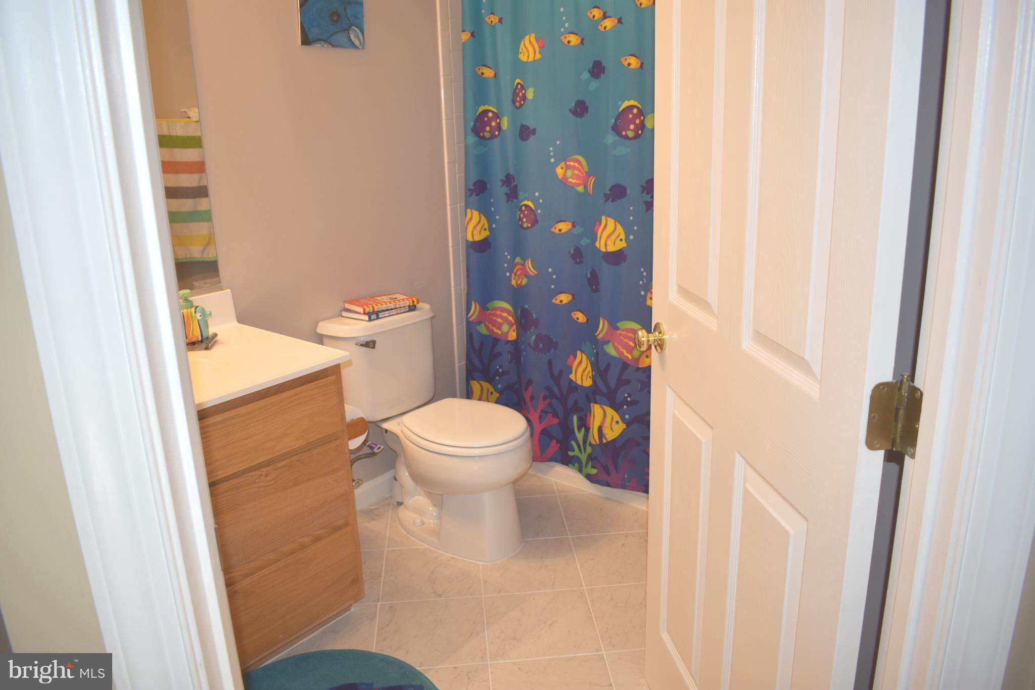6667 Debra Lu Way Springfield, VA 22150 - Photo 17 of 30 Middle Bath w/New Tile Floor!
