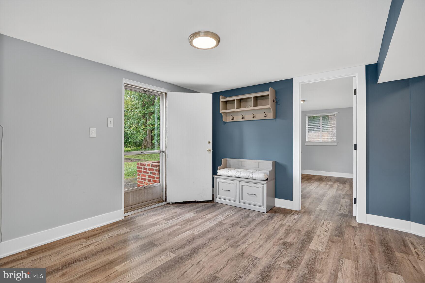 7319 Leesville Boulevard Springfield, VA 22151 - Photo 15 of 18 a view of empty room with wooden floor and fan