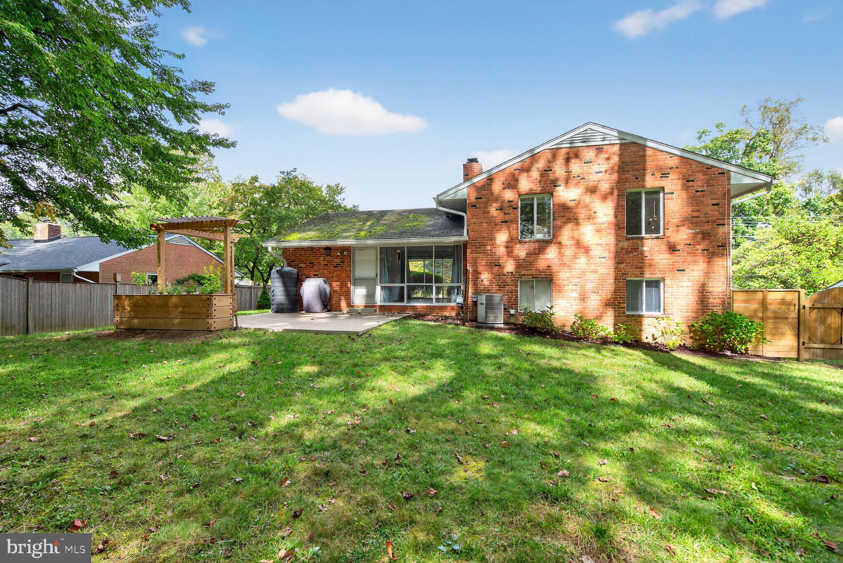 7319 Leesville Boulevard Springfield, VA 22151 - Photo 3 of 18 a view of a house with backyard