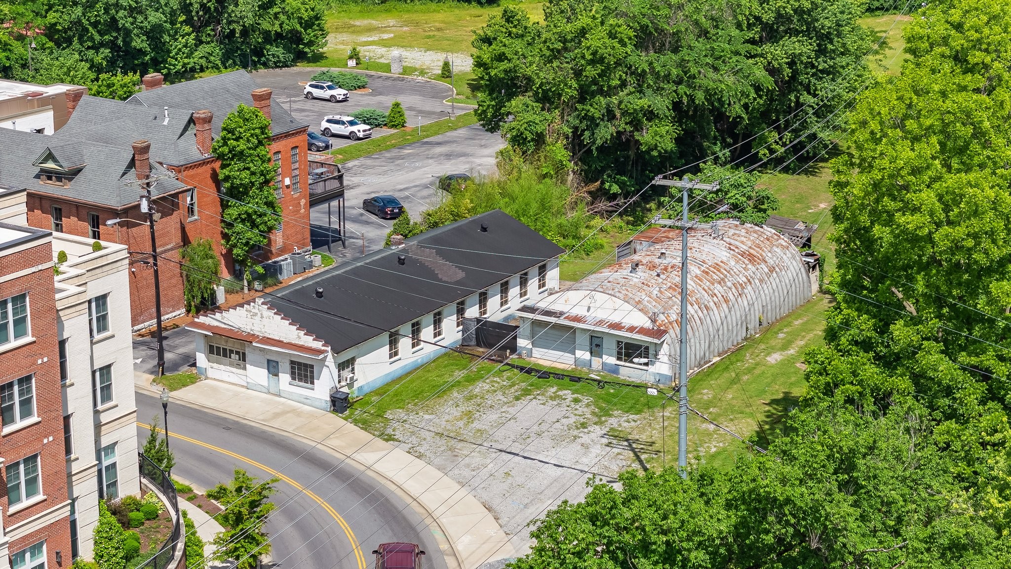 106 Bridge Street Franklin, TN 37064 - Photo 3 of 16 an aerial view of a house with a garden