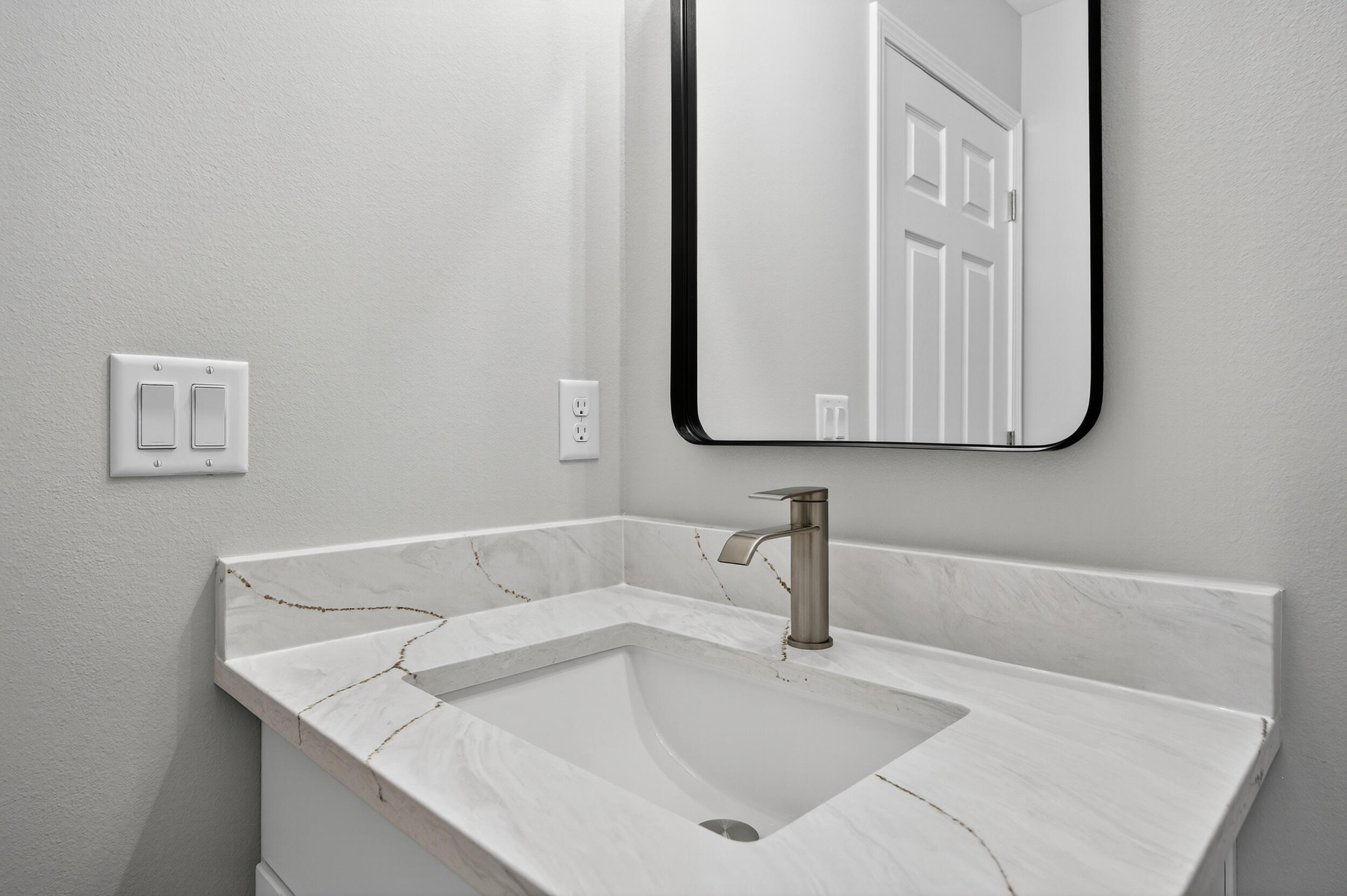 5327 B Kervin Road Crestview, FL 32539 - Photo 26 of 47 a bathroom with a sink and a mirror