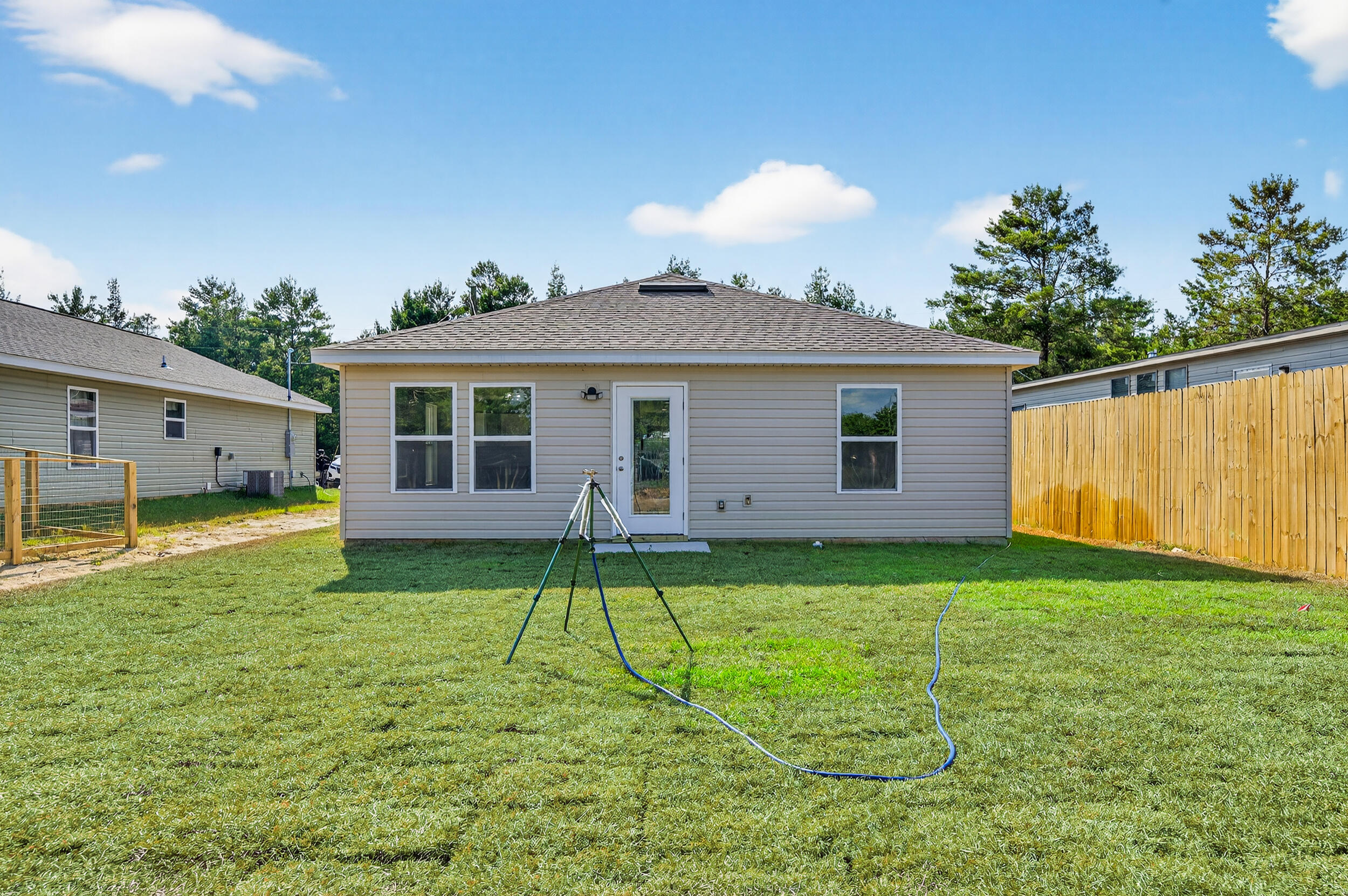 5327 B Kervin Road Crestview, FL 32539 - Photo 46 of 47 a backyard of a house with table and chairs