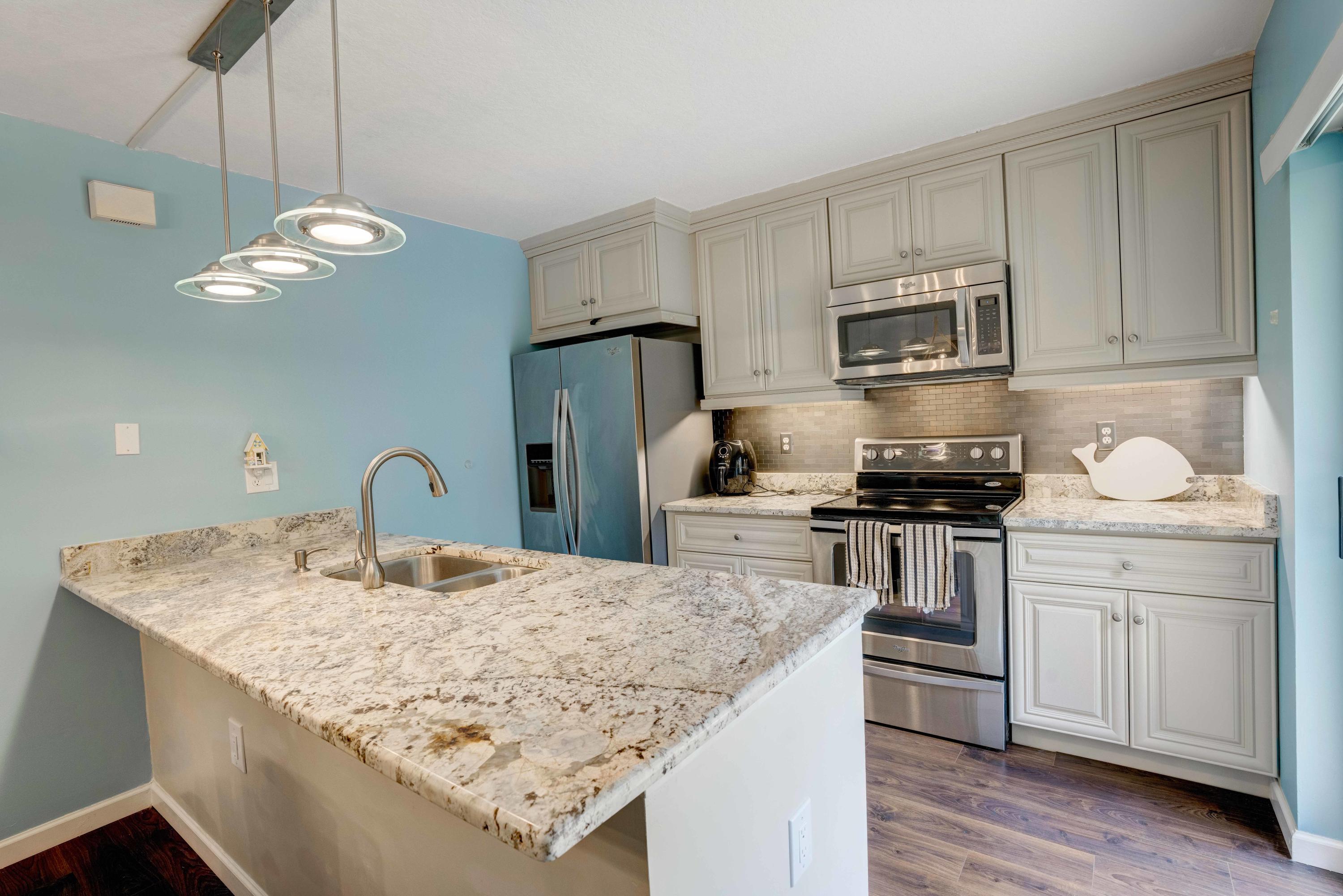 2430 24th Court Jupiter, FL 33477 - Photo 2 of 24 2nd kitchen
