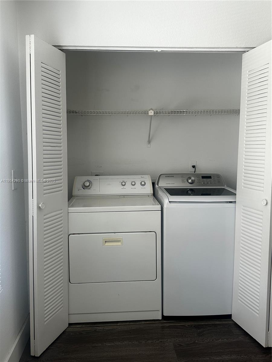 3360 Pinewalk Drive North, Unit 1325 Margate, FL 33063 - Photo 15 of 16 a utility room with dryer and washer