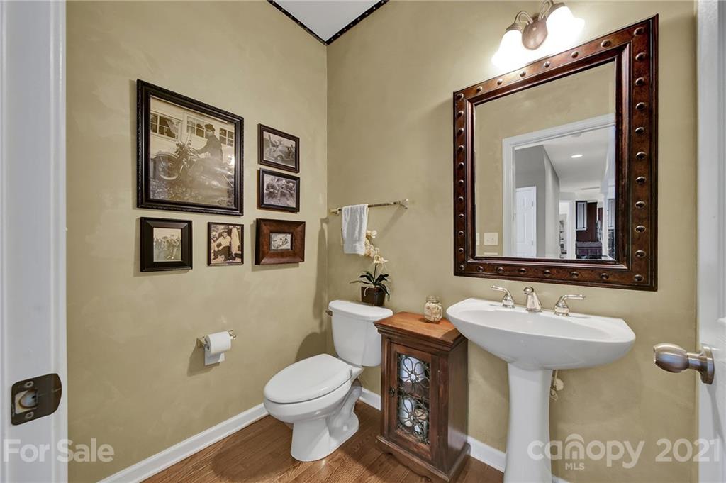 635 Panthers Way Fort Mill, SC 29708 - Photo 26 of 47 a bathroom with a toilet sink and mirror