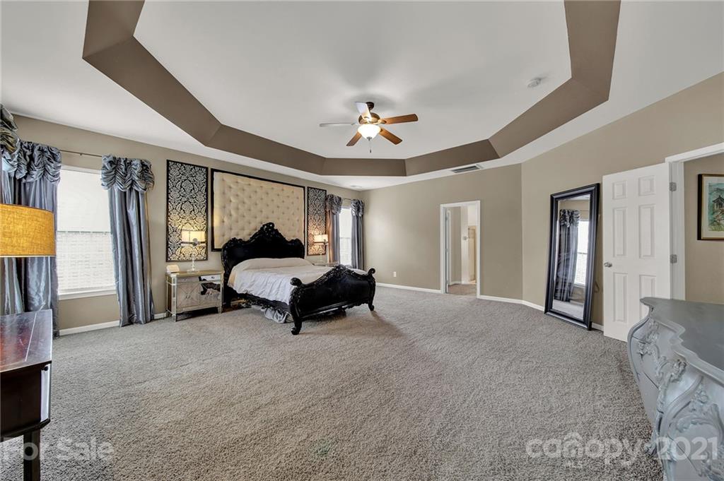 635 Panthers Way Fort Mill, SC 29708 - Photo 29 of 47 a living room with furniture and a ceiling fan