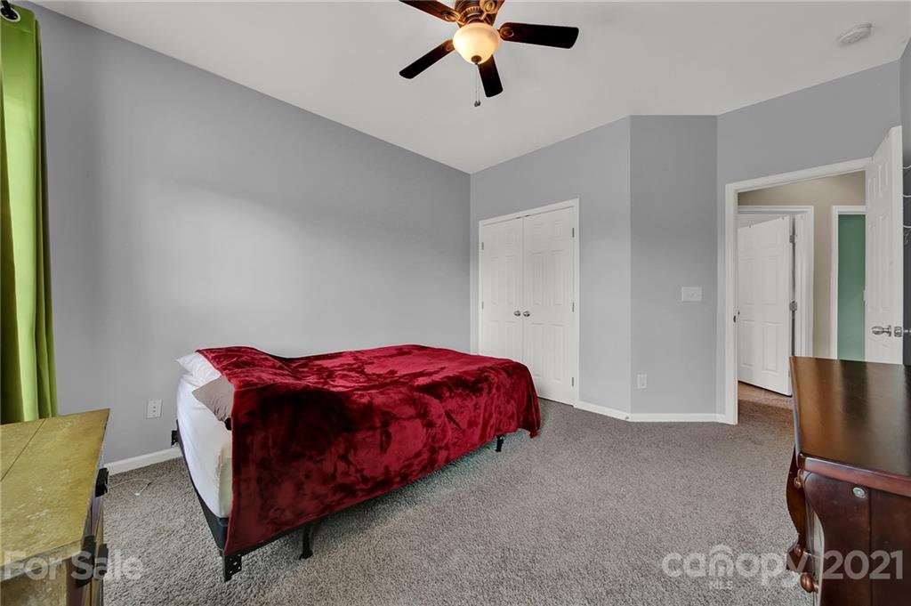 635 Panthers Way Fort Mill, SC 29708 - Photo 35 of 47 a bed room with a bed and a television
