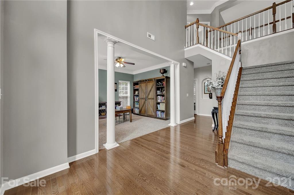 635 Panthers Way Fort Mill, SC 29708 - Photo 5 of 47 a view of entryway and hall with wooden floor