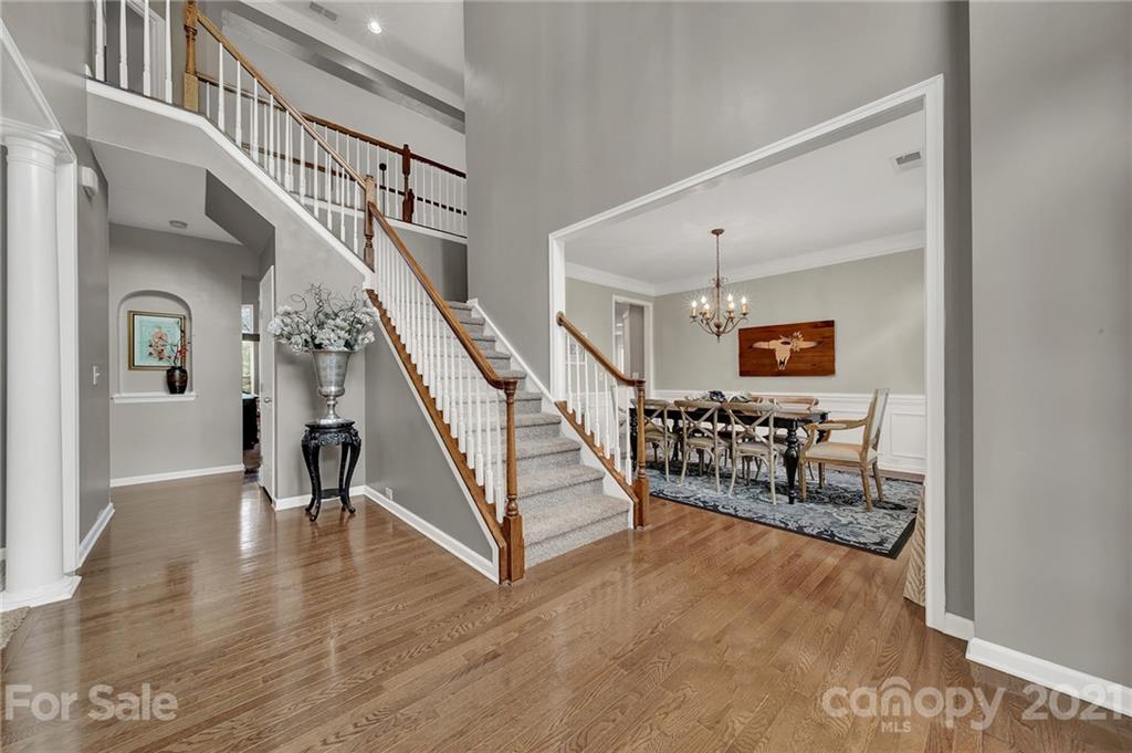 635 Panthers Way Fort Mill, SC 29708 - Photo 6 of 47 a view of entryway and hall with wooden floor