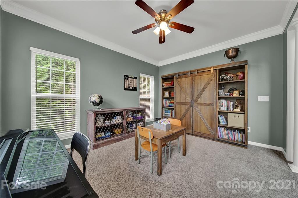 635 Panthers Way Fort Mill, SC 29708 - Photo 7 of 47 a living room with furniture and a window