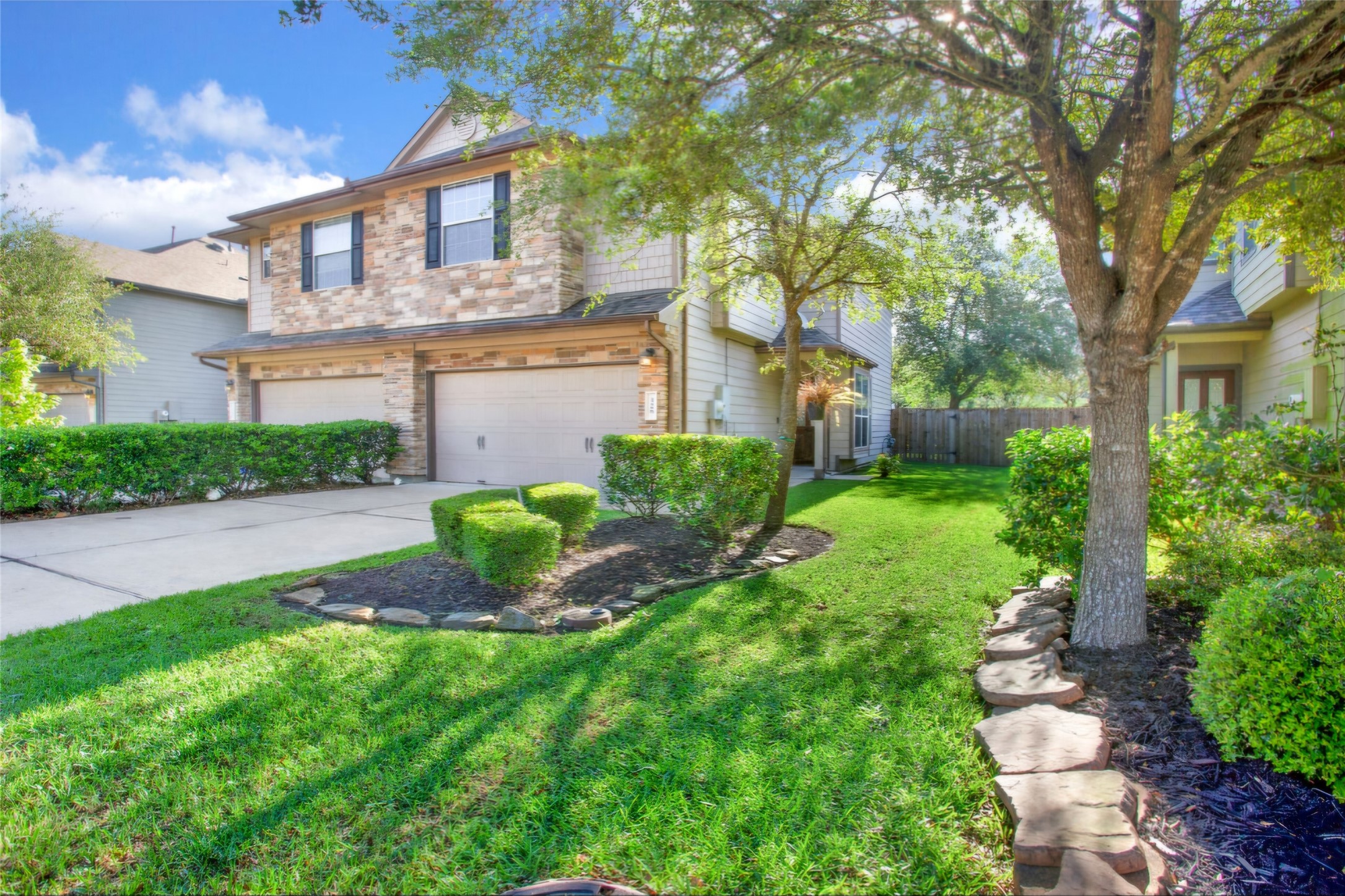 a backyard of a house with lots of green space