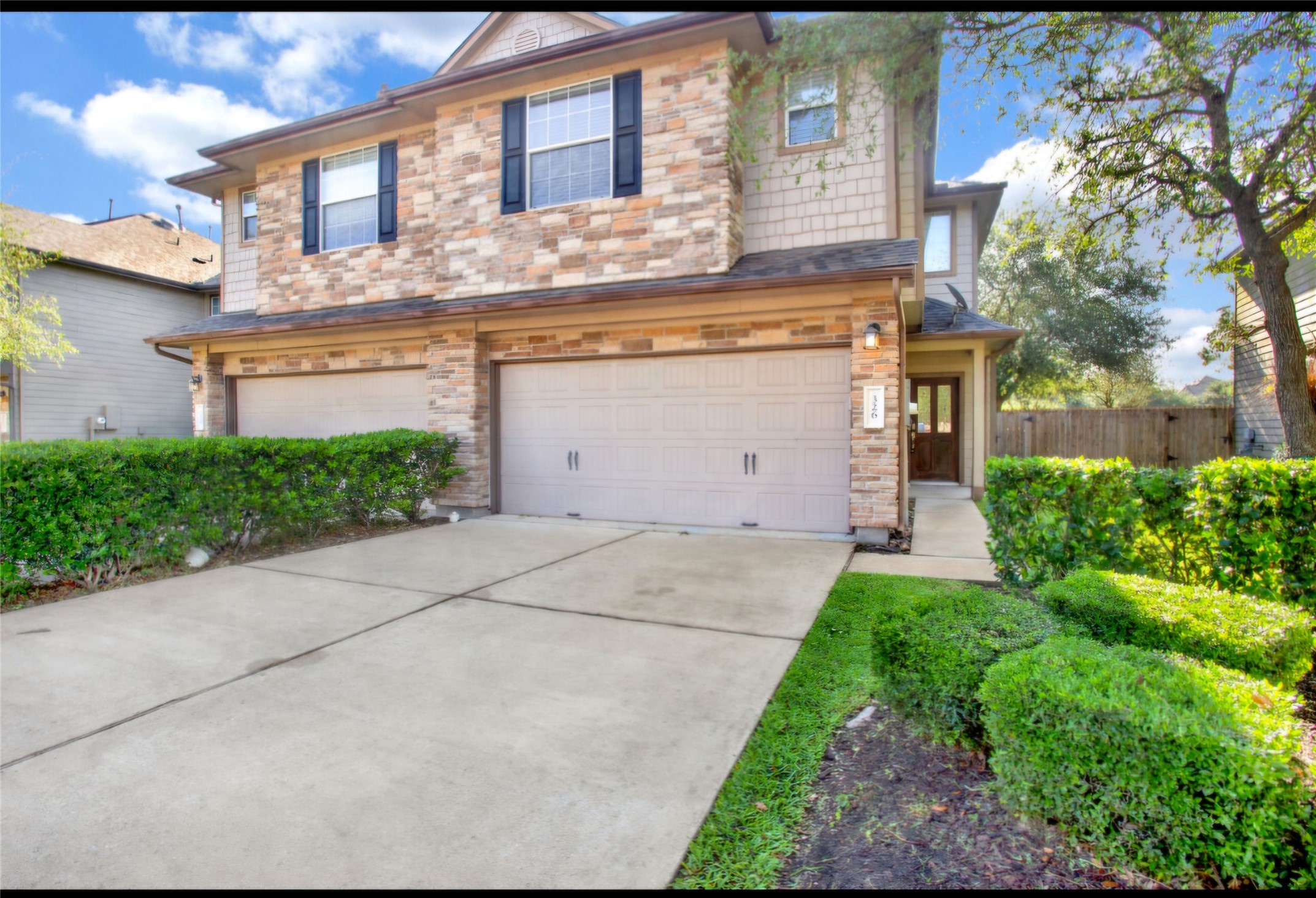 326 Brandy Ridge Lane Dickinson, TX 77539 - Photo 2 of 22 a view of a house with a yard and potted plants