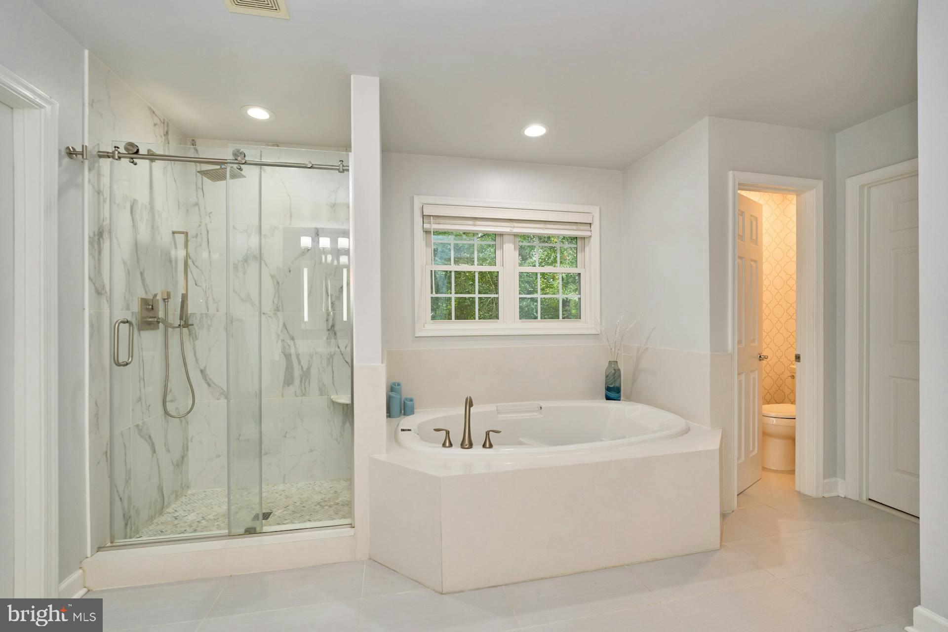 413 Adahi Road Southeast Vienna, VA 22180 - Photo 29 of 62 Upgraded Primary Bathroom w/Glass Shower Doors