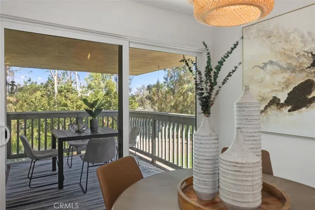 a view of a balcony with wooden floor