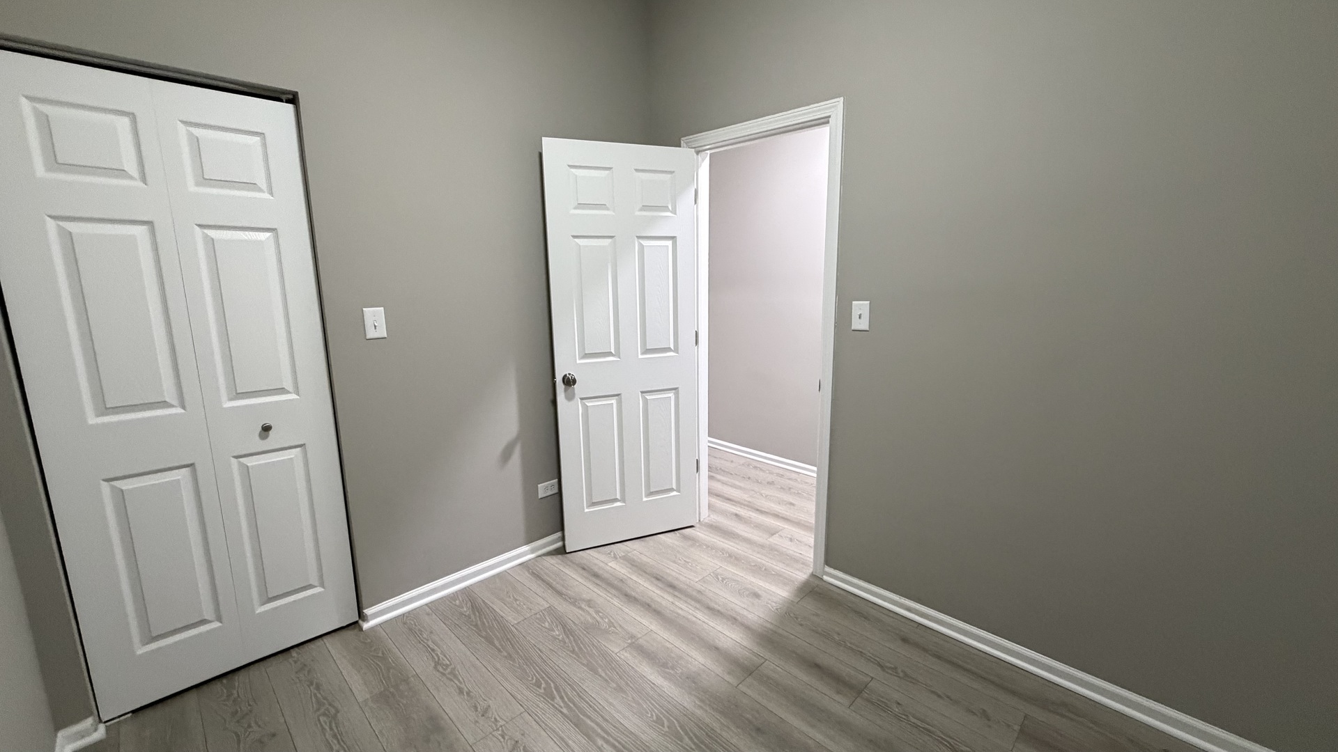 5344 South Aberdeen Street, Unit 1 Chicago, IL 60609 - Photo 15 of 17 an empty room with wooden floor