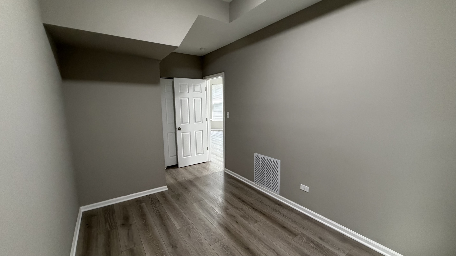 5344 South Aberdeen Street, Unit 1 Chicago, IL 60609 - Photo 6 of 17 a view of hallway with wooden floor
